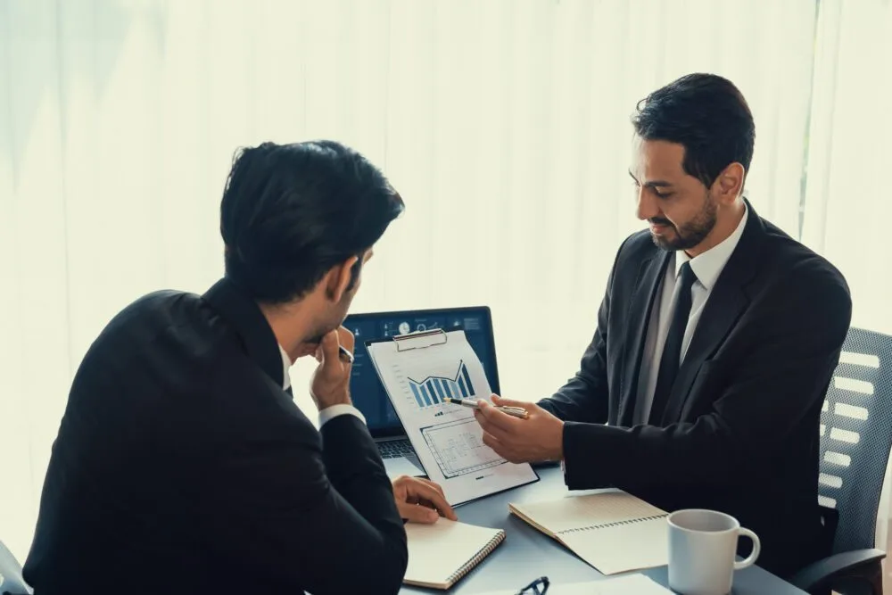 Friendly New Zealand life insurance adviser at work